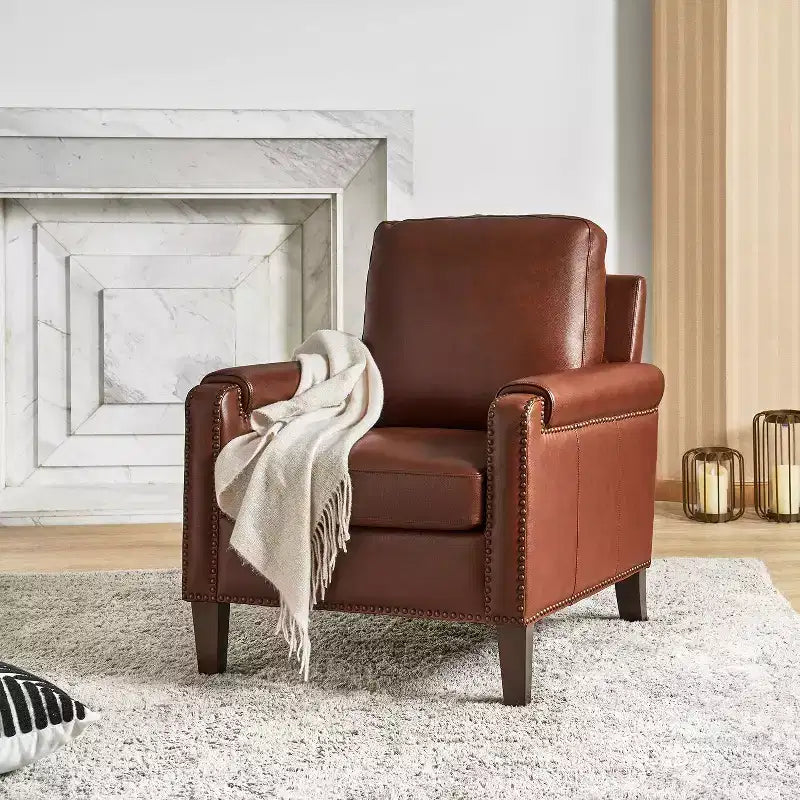Fauteuil en cuir véritable avec coussin amovible et clous décoratifs