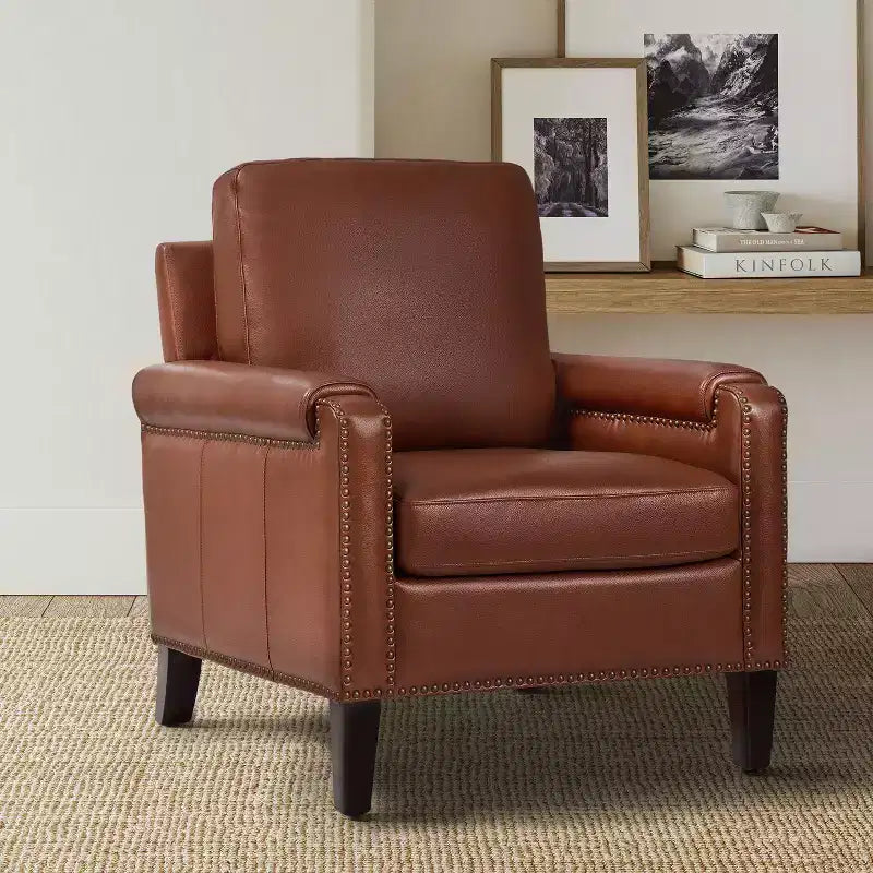 Fauteuil en cuir véritable avec coussin amovible et clous décoratifs