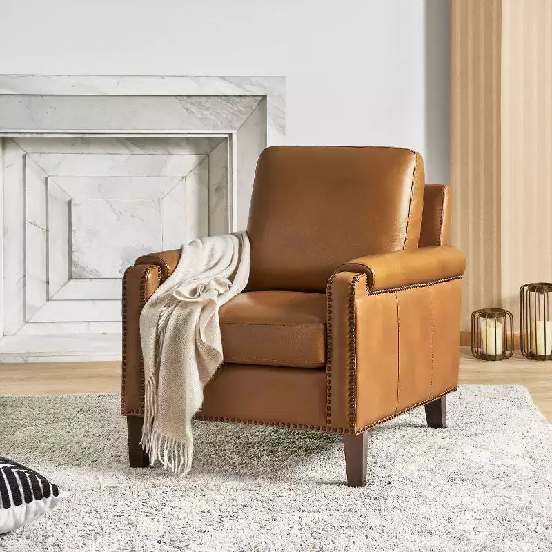 Fauteuil en cuir véritable avec coussin amovible et clous décoratifs
