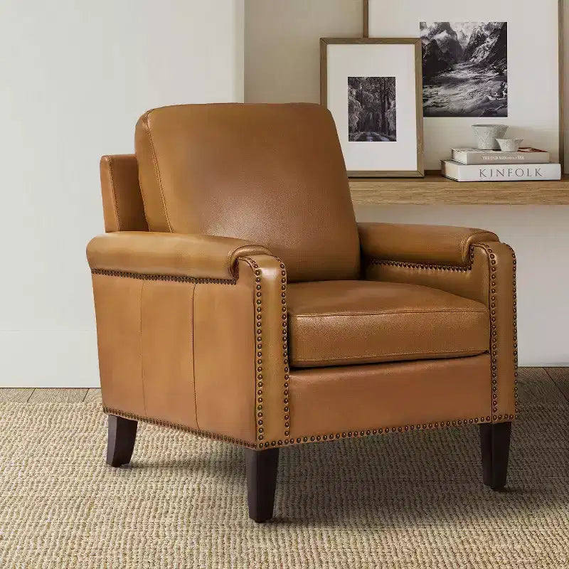 Fauteuil en cuir véritable avec coussin amovible et clous décoratifs