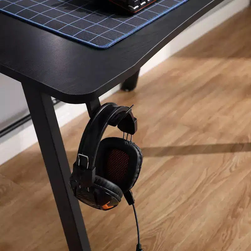 Bureau Gaming avec Lumières LED et Support Casque – 112 cm P x 70 cm L x 75 cm H, Cadre en Acier, Supporte 59 kg