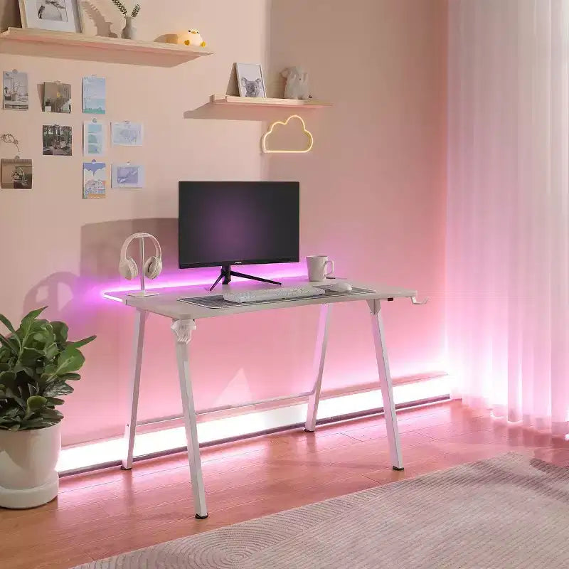 Bureau Gaming avec Lumières LED et Support Casque – 112 cm P x 70 cm L x 75 cm H, Cadre en Acier, Supporte 59 kg