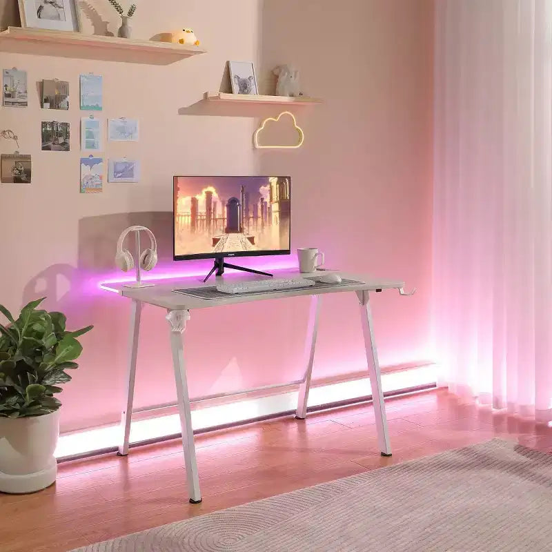 Bureau Gaming avec Lumières LED et Support Casque – 112 cm P x 70 cm L x 75 cm H, Cadre en Acier, Supporte 59 kg