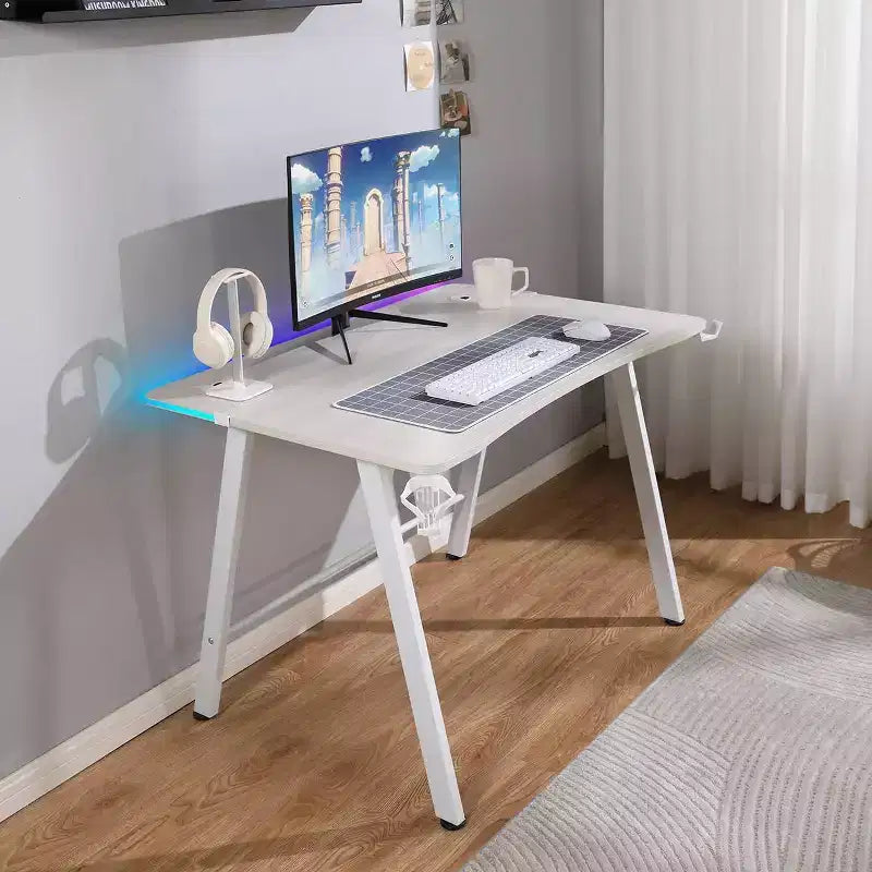 Bureau Gaming avec Lumières LED et Support Casque – 112 cm P x 70 cm L x 75 cm H, Cadre en Acier, Supporte 59 kg